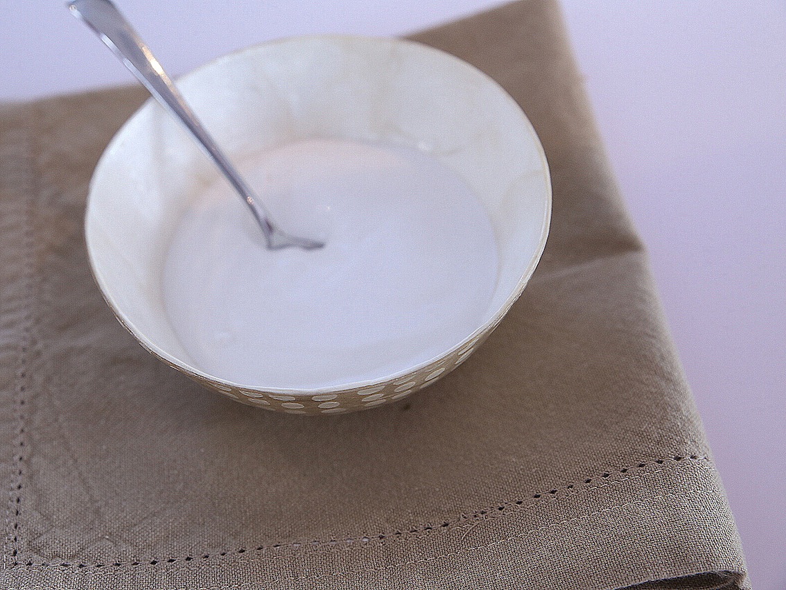 Coconut yoghurt bowl on tan