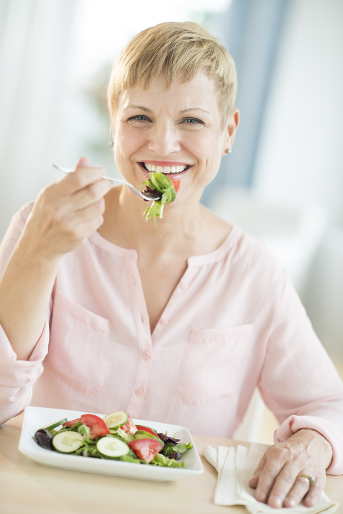 Woman Eating Veges